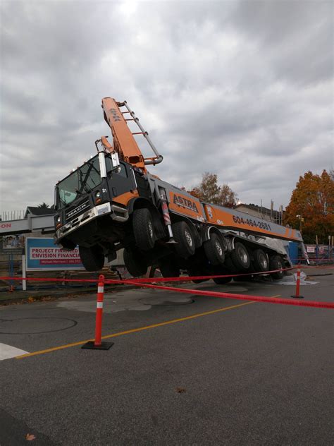 Never seen a concrete pumping truck do this before! : pics