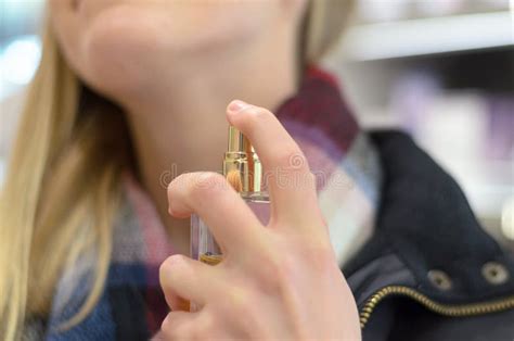 Woman Spraying Perfume On Neck Stock Image - Image of person, bottle ...