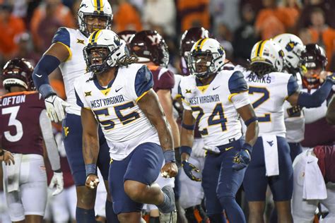 Jacolby Spells' pick-6 pushes WVU past Virginia Tech 33-10 to keep ...