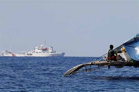 China military says Philippine ship 'illegally entered' waters near ...