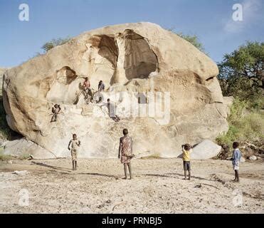 Hadzabe, Hadza tribe hunting with bow and arrow Tanzania Collection Stock Photo - Alamy