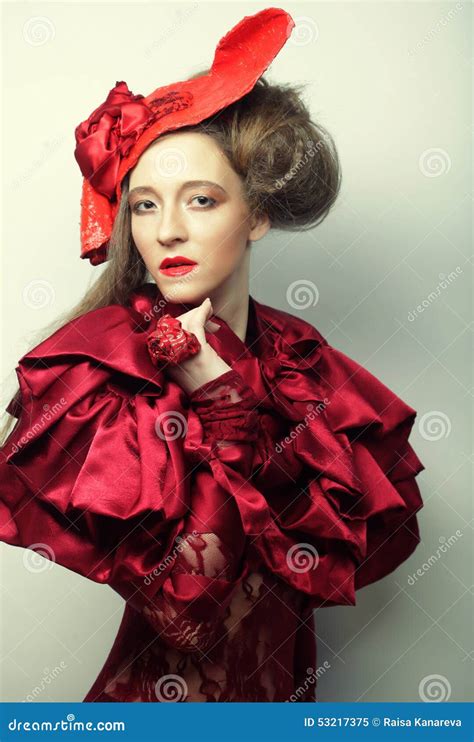 Fashion Model in Bright Red Costume and Red Hat Stock Image - Image of ...