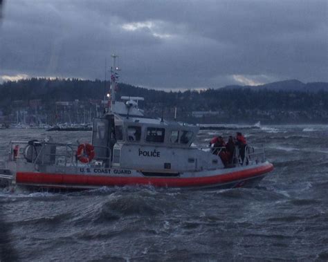 Coast Guard rescues 3 from fishing boat that rammed into rocks amid ...