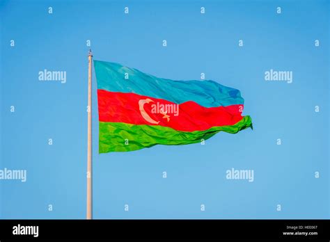 Azeri flag waving in wind at national flag square hi-res stock photography and images - Alamy