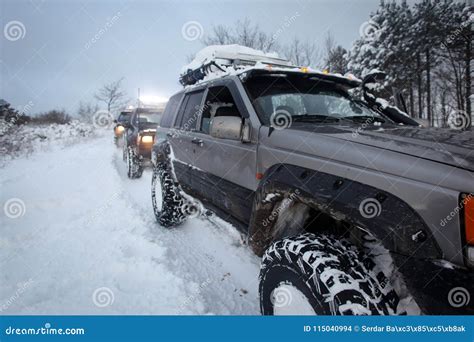 SUV on snow stock photo. Image of motor, jeep, drive - 115040994