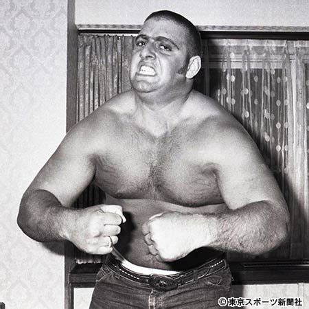 Young Ric Flair with a buzz cut