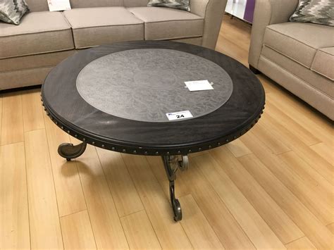 42" ROUND DARK WOOD & METAL COCKTAIL TABLE - Able Auctions