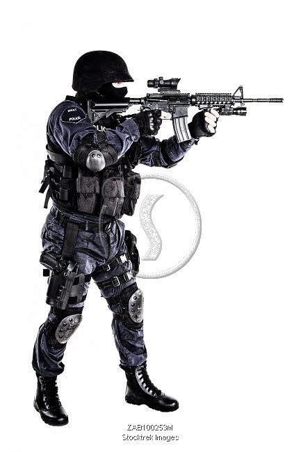 Special weapons and tactics (SWAT) team officer with his gun. | Stocktrek Images