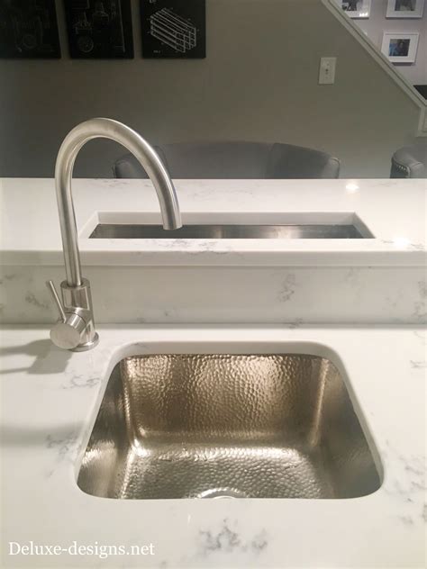 Basement Wet Bar with Quartz Countertop and Hammered Nickel Sink