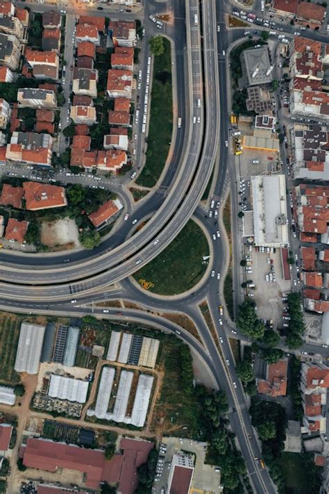 Aerial View of Roads and Buildings in City · Free Stock Photo