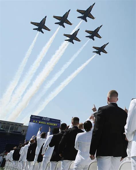 The U.S. Navy #BlueAngels fly over graduation ceremonies at the United States Naval Academy ...