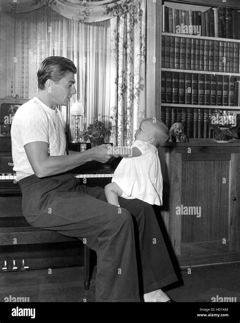 Ronald Reagan playing with daughter Maureen Reagan at home in the early ...