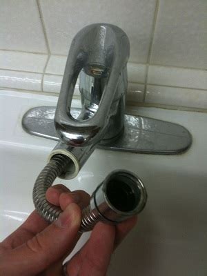 plumbing - Why does my new replacement pull-out kitchen faucet sprayer leak? - Home Improvement ...