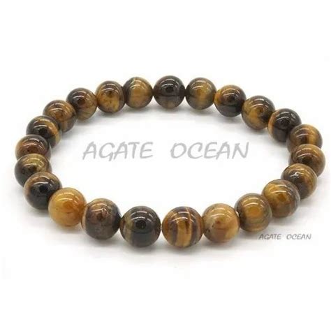 Yellow Tiger Eye Bracelet at best price in Khambhat by Agate Ocean | ID: 22641408230