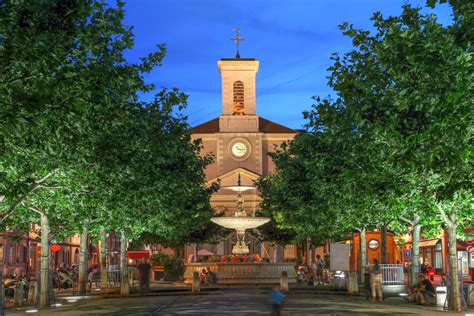 Night scene in Place de Marche, Carouge, Geneva, Switzerland with the ...