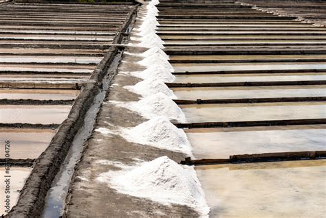 Sea salt extracted by evaporation of salt water Stock Photo | Adobe Stock