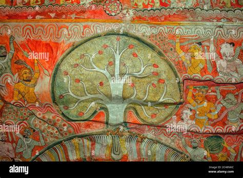 Paintings of demons near the tree of wisdom inside Dambulla cave temple complex in Sri Lanka ...