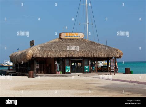 De Palm Pier Sales & Activities Center Palm Beach Aruba Stock Photo - Alamy