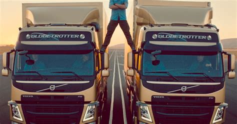 Jean-Claude Van Damme performs amazing split between moving trucks