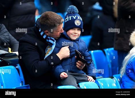 Manchester City fans during the FA Cup fourth round match at the Etihad ...