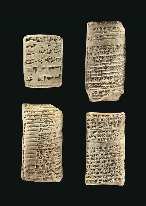 FOUR OLD BABYLONIAN CLAY CUNEIFORM TABLETS