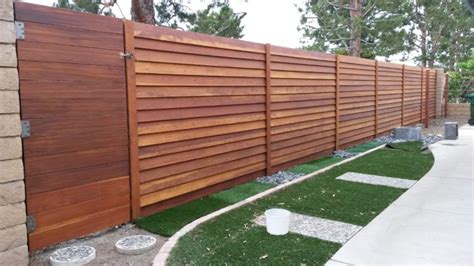 AFTER-1x6 Modern Horizontal Stained Redwood Privacy Fence - WoodFenceExpert.com