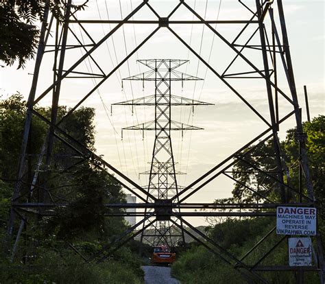 20190814. A transmission tower framed in a transmission tower ...