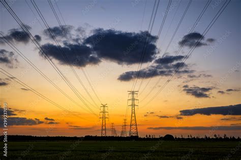 High voltage electricity tower sky sunset landscape,industrial background. Stock Photo | Adobe Stock