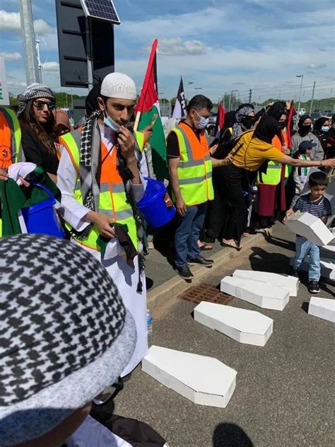 Protesters descend on BAE Systems with 'stop arming Israel' funeral procession for Gaza children ...