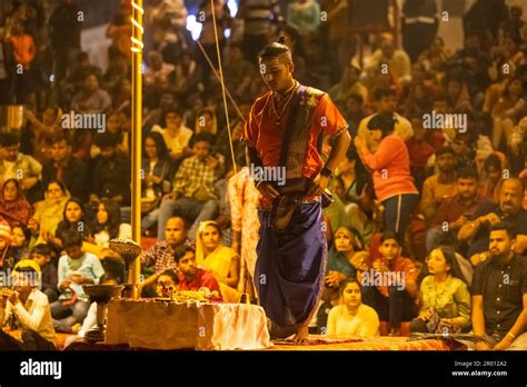 Ganga aarti, Portrait of an young priest performing river ganges ...