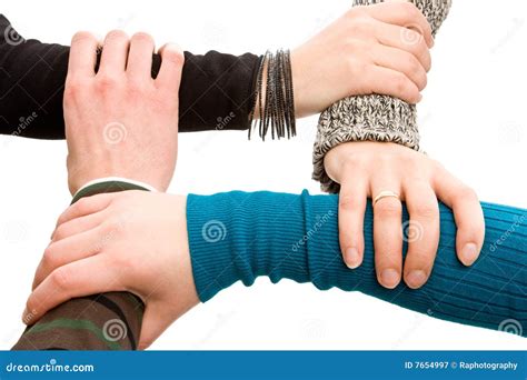 Four hands joined together stock image. Image of female - 7654997