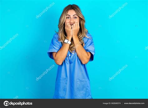 Fearful Beautiful Doctor Woman Standing Blue Studio Background Keeps Hands — Stock Photo ...