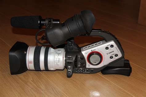 Canon XL2 professional video camera with divers accessories. - Catawiki