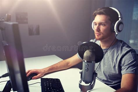 Man in Headset Playing Computer Video Game at Home Stock Image - Image ...