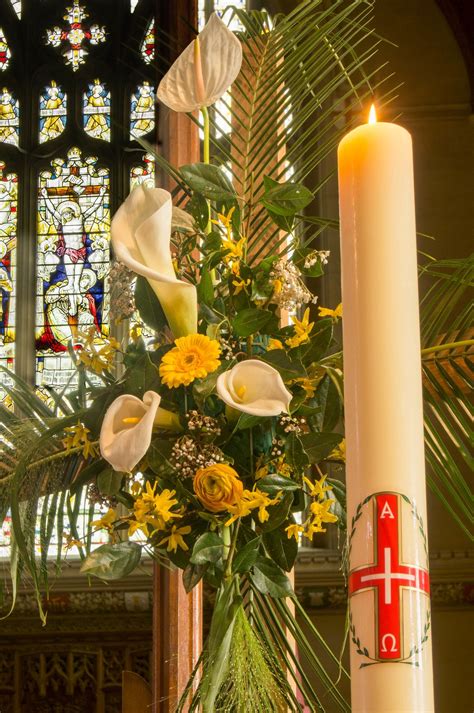 Easter Flowers and Paschal Candle | Easter flowers, Church easter ...