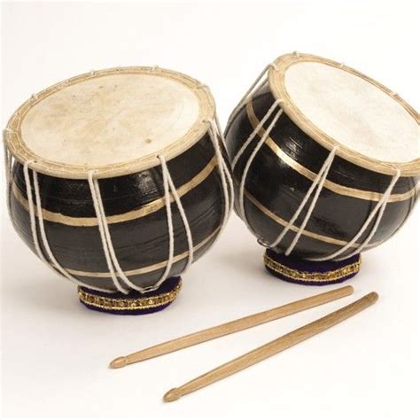 NAGARA - Type of instrument used to accompany dances and songs of Haryana.