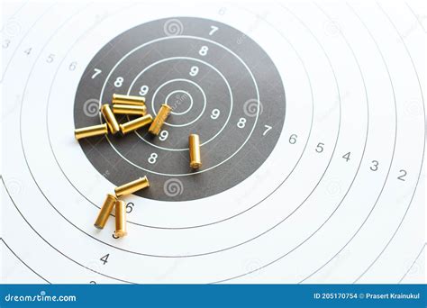 Bullets on Paper Target for Shooting Practice Stock Photo - Image of defense, background: 205170754