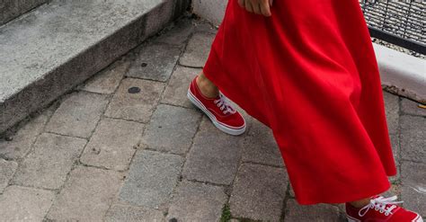 Close-up of Woman Walking on a Sidewalk in All Red Outfit · Free Stock ...