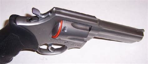 Taurus Model 65 Stainless 357 4 Inch W/Holster For Sale at GunAuction.com - 8435299