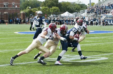 Harvard bested Georgetown in football, 34-3, to make its record 3-0. | Harvard Magazine