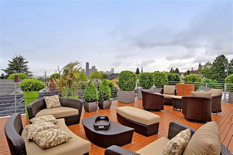 Roof Deck With Wicker Sofas | Rooftop design, Outdoor sofa sets ...