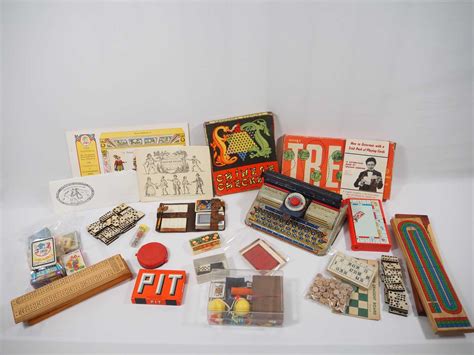 Lot 365 - A collection of vintage toys to include