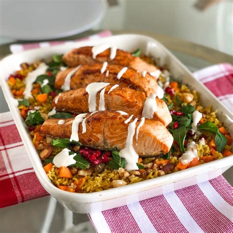 Baked Salmon & Yellow Rice salad with a Tahini, Lemon Dressing | Yellow rice recipes, Salad ...