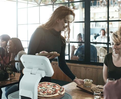 New Restaurant Serving Robot Works Tables and Assists Staff