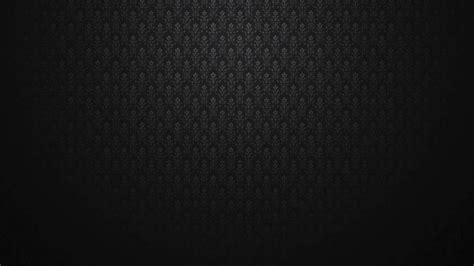 Download A Black Background With A Pattern | Wallpapers.com