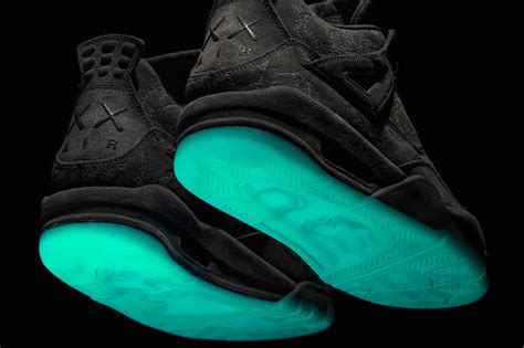 KAWS Air Jordan 4 Glow In The Dark Sole | SneakerNews.com