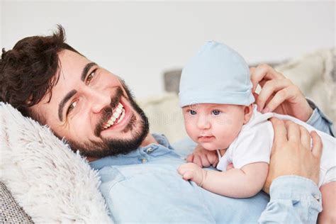 Laughing Father and His Little Baby Stock Photo - Image of hold, happy: 123809364