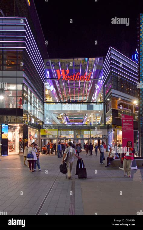 Westfield shopping mall entrance with warm summer evening late night shoppers Stock Photo - Alamy