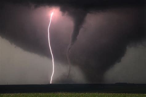 Caught by storm chaser Pecos Hank in Nebraska in 2014: a lightning bolt and two tornadoes at ...