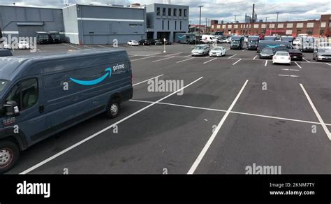 Amazon Prime delivery truck at Amazon Hub warehouse. Drivers deliver Stock Video Footage - Alamy